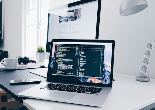 Macbook with VSCode Program